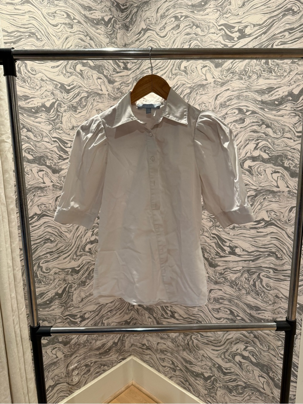 ANTONIO MELANI Light Blue Label on White Garment